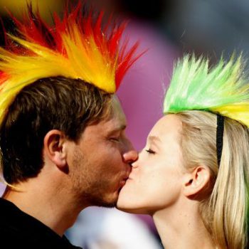 FRANKFURT AM MAIN, GERMANY - JULY 06:  Fans kisses during the FIFA Women's World Cup 2011 Group D match between Equatorial Guinea and Brazil at FIFA World Cup stadium Frankfurt on July 6, 2011 in Frankfurt am Main, Germany.  (Photo by Friedemann Vogel/Getty Images)